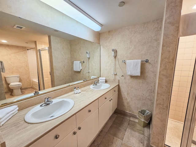 8560 Queensway Blvd Unit 508, Myrtle Beach, SC 29572 - full bath featuring a shower with door, double vanity, and tile patterned floors