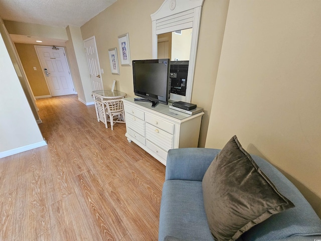 8560 Queensway Blvd Unit 508, Myrtle Beach, SC 29572 - living room with light wood-style floors and baseboards