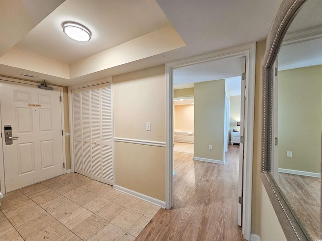 8560 Queensway Blvd Unit 508, Myrtle Beach, SC 29572 - foyer featuring a raised ceiling and baseboards