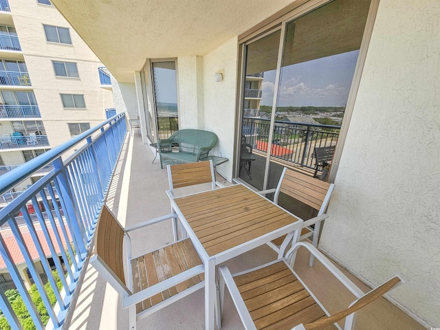 8560 Queensway Blvd Unit 508, Myrtle Beach, SC 29572 - balcony featuring outdoor dining area