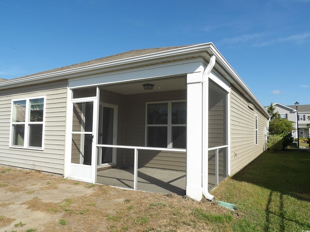 192 Mountain Ash Ln, Myrtle Beach, SC 29579 - back of property with a sunroom