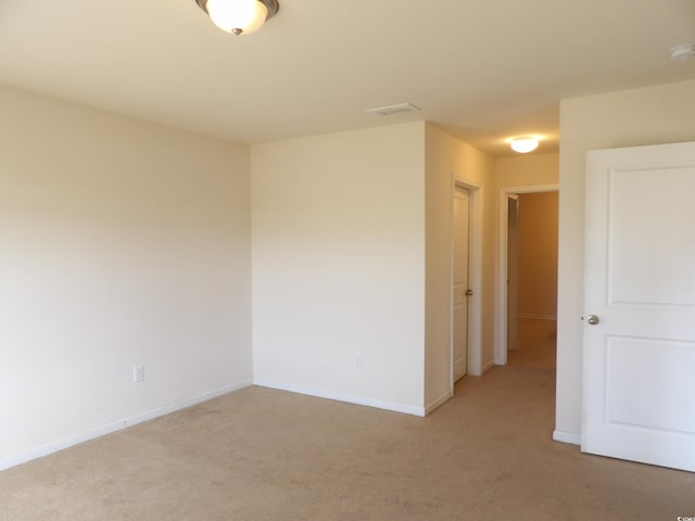 192 Mountain Ash Ln, Myrtle Beach, SC 29579 - spare room with light colored carpet, baseboards, and a smoke detector