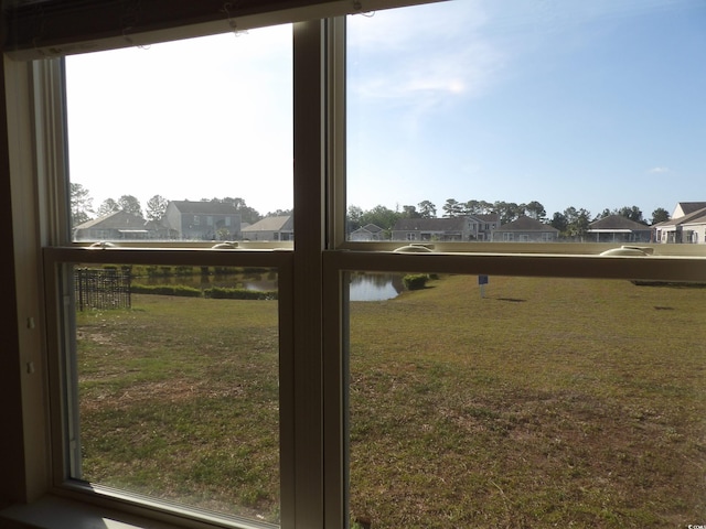 192 Mountain Ash Ln, Myrtle Beach, SC 29579 - view of green lawn with a residential view and a water view