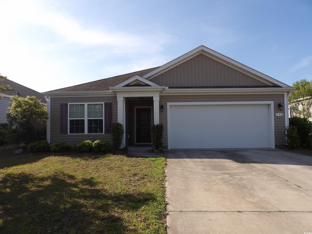 192 Mountain Ash Ln, Myrtle Beach, SC 29579 - view of front facade featuring driveway, an attached garage, and a front yard