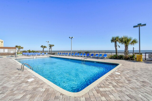 1501 S Ocean Blvd Unit 1031, Myrtle Beach, SC 29577 - community pool featuring a patio area