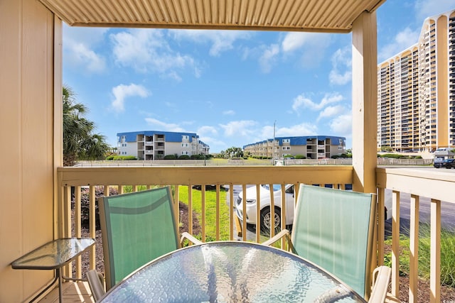 9661 Shore Dr Unit A1, Myrtle Beach, SC 29572 - balcony with outdoor dining space