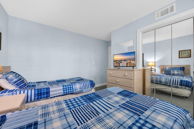 9661 Shore Dr Unit A1, Myrtle Beach, SC 29572 - carpeted bedroom with a closet and baseboards