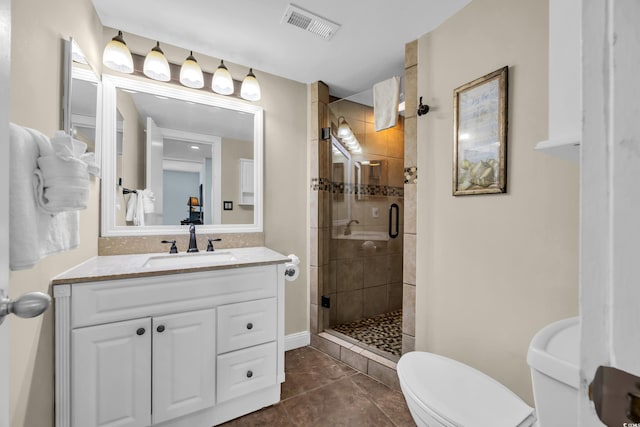 9661 Shore Dr Unit A1, Myrtle Beach, SC 29572 - full bathroom featuring a shower stall, tile patterned floors, toilet, vanity, and baseboards
