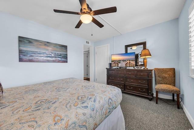 9661 Shore Dr Unit A1, Myrtle Beach, SC 29572 - carpeted bedroom featuring baseboards, ceiling fan, and multiple windows
