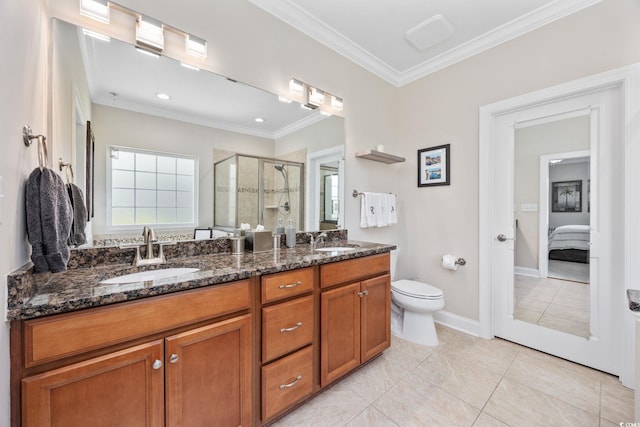 full bathroom with a stall shower, toilet, double vanity, tile patterned flooring, and crown molding