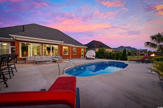 view of swimming pool featuring an outdoor hangout area and a patio area