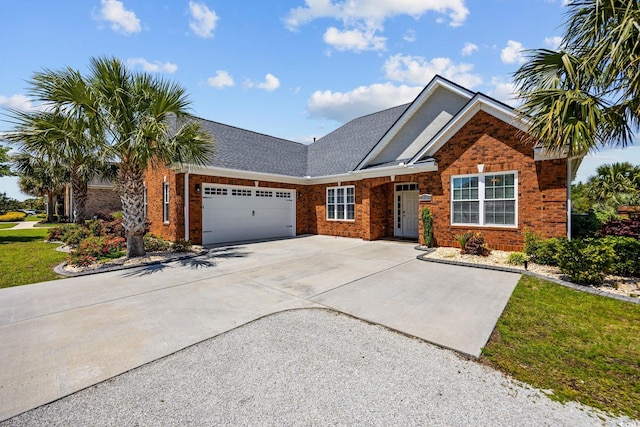 view of front facade with driveway, an attached garage, brick siding, roof with shingles, and a front lawn