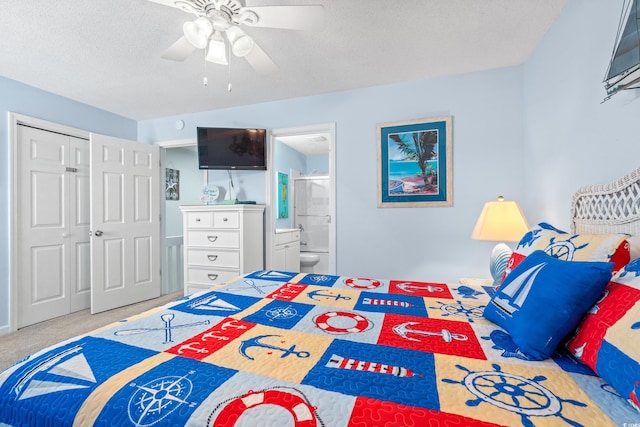 7403 N Ocean Blvd Unit C, Myrtle Beach, SC 29572 - bedroom with a closet, ensuite bathroom, carpet flooring, a ceiling fan, and a textured ceiling