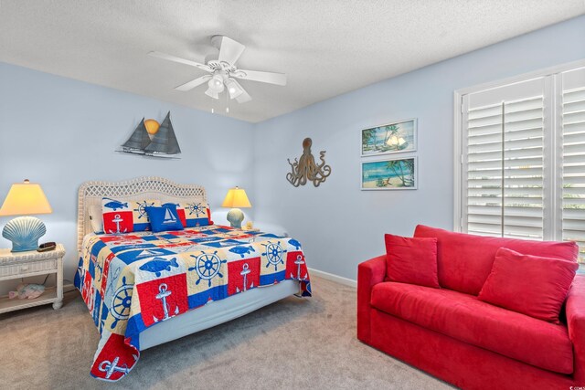 7403 N Ocean Blvd Unit C, Myrtle Beach, SC 29572 - carpeted bedroom featuring a textured ceiling, ceiling fan, and baseboards