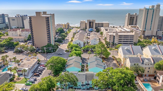 7403 N Ocean Blvd Unit C, Myrtle Beach, SC 29572 - drone / aerial view of a pool area and a large body of water