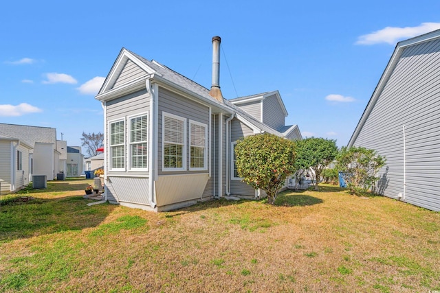 314 Lyons Cove Dr, Myrtle Beach, SC 29577 - view of side of property featuring central air condition unit and a yard