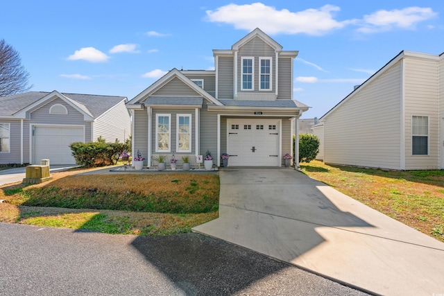 314 Lyons Cove Dr, Myrtle Beach, SC 29577 - view of front of property with concrete driveway and a garage