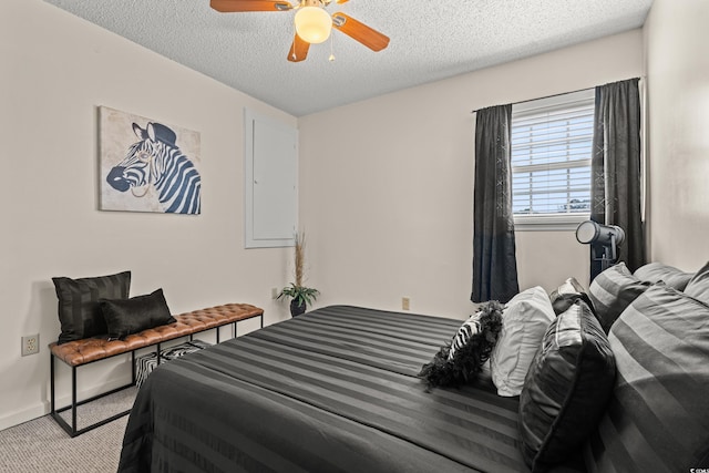 314 Lyons Cove Dr, Myrtle Beach, SC 29577 - bedroom with a textured ceiling, carpet flooring, ceiling fan, and baseboards