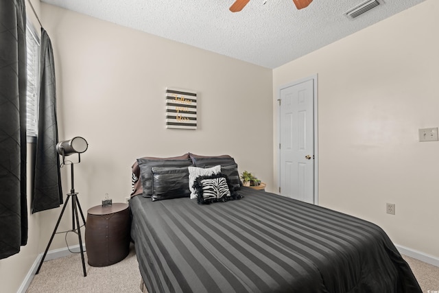 314 Lyons Cove Dr, Myrtle Beach, SC 29577 - carpeted bedroom with baseboards, a textured ceiling, and ceiling fan