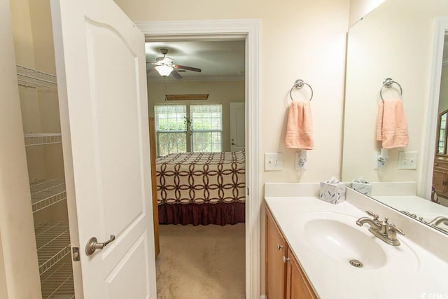 1028 Fairway Ln Unit 71, Conway, SC 29526 - bathroom with vanity, a ceiling fan, and crown molding