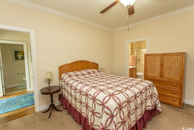 1028 Fairway Ln Unit 71, Conway, SC 29526 - bedroom with ornamental molding, ensuite bathroom, light carpet, and baseboards