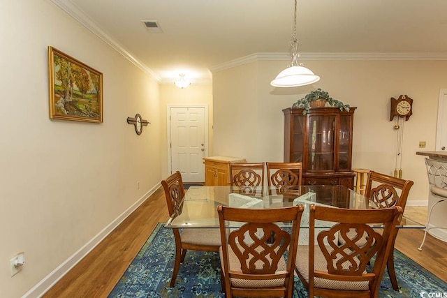 1028 Fairway Ln Unit 71, Conway, SC 29526 - dining room with wood finished floors, crown molding, and baseboards