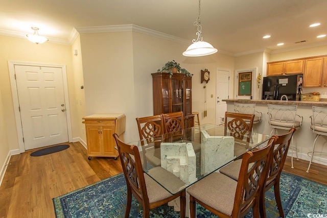 1028 Fairway Ln Unit 71, Conway, SC 29526 - dining room featuring light wood-style floors, ornamental molding, recessed lighting, and baseboards