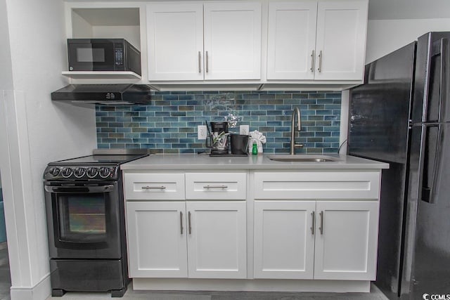 2401 S Ocean Blvd S Unit 1064, Myrtle Beach, SC 29577 - kitchen featuring black appliances, a sink, light countertops, and white cabinetry