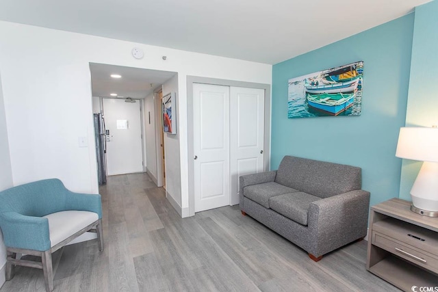 2401 S Ocean Blvd S Unit 1064, Myrtle Beach, SC 29577 - living area with light wood finished floors and baseboards