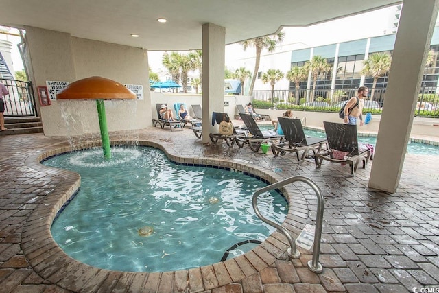 2401 S Ocean Blvd S Unit 1064, Myrtle Beach, SC 29577 - community pool with a patio