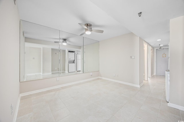 4000 N Ocean Blvd Unit 1002, North Myrtle Beach, SC 29582 - spare room featuring a ceiling fan, baseboards, and a pendent fire sprinkler