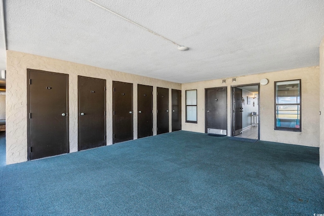4000 N Ocean Blvd Unit 1002, North Myrtle Beach, SC 29582 - empty room with carpet floors and a textured ceiling