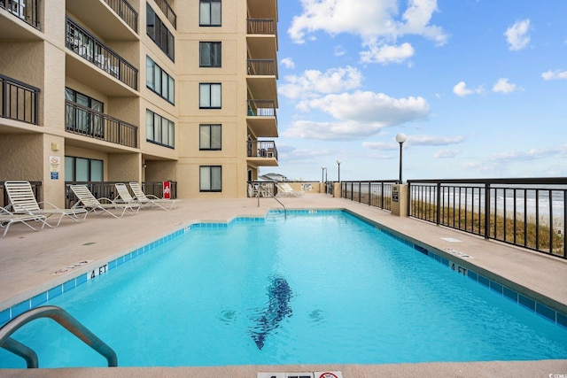 4000 N Ocean Blvd Unit 1002, North Myrtle Beach, SC 29582 - community pool featuring a patio area