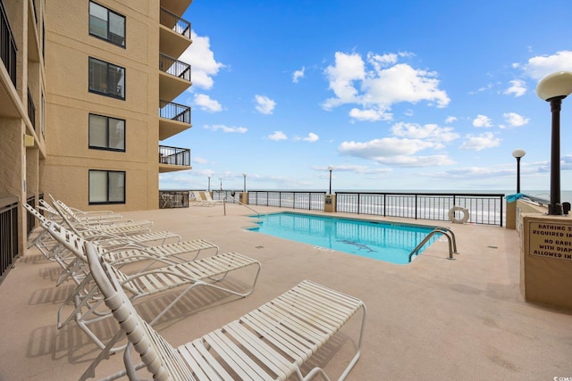 4000 N Ocean Blvd Unit 1002, North Myrtle Beach, SC 29582 - community pool with a patio