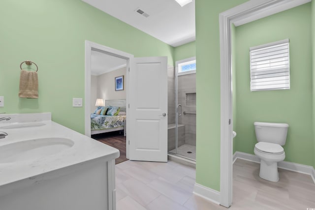 1012 Mary Read Dr, North Myrtle Beach, SC 29582 - ensuite bathroom with a shower stall, double vanity, and lofted ceiling