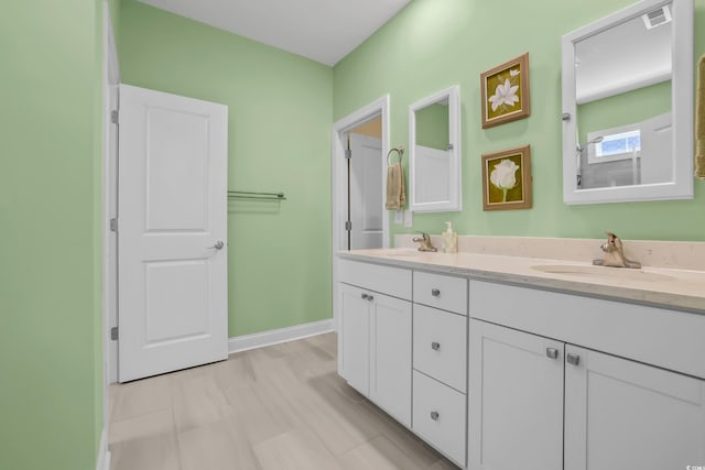 1012 Mary Read Dr, North Myrtle Beach, SC 29582 - bathroom featuring double vanity and baseboards