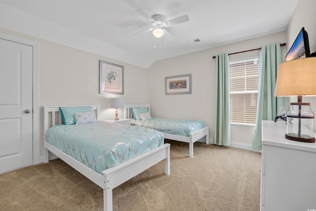 1012 Mary Read Dr, North Myrtle Beach, SC 29582 - bedroom with light colored carpet, a ceiling fan, and vaulted ceiling