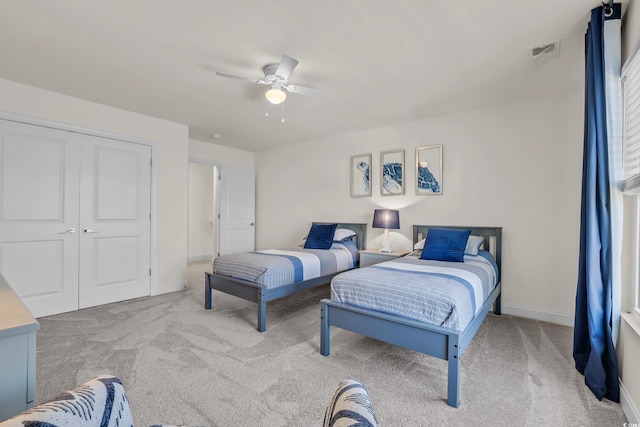 1012 Mary Read Dr, North Myrtle Beach, SC 29582 - carpeted bedroom featuring baseboards, a ceiling fan, and a closet