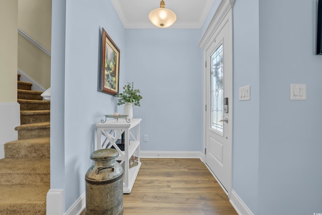 1012 Mary Read Dr, North Myrtle Beach, SC 29582 - foyer featuring stairway, wood finished floors, baseboards, and crown molding