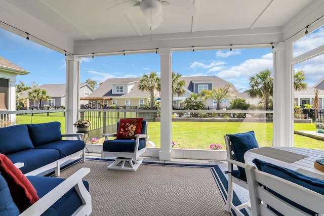 1012 Mary Read Dr, North Myrtle Beach, SC 29582 - sunroom with a ceiling fan, a residential view, and an outdoor living space