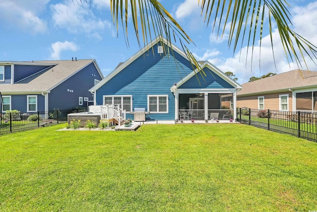 1012 Mary Read Dr, North Myrtle Beach, SC 29582 - rear view of property with a hot tub, a sunroom, and a fenced backyard