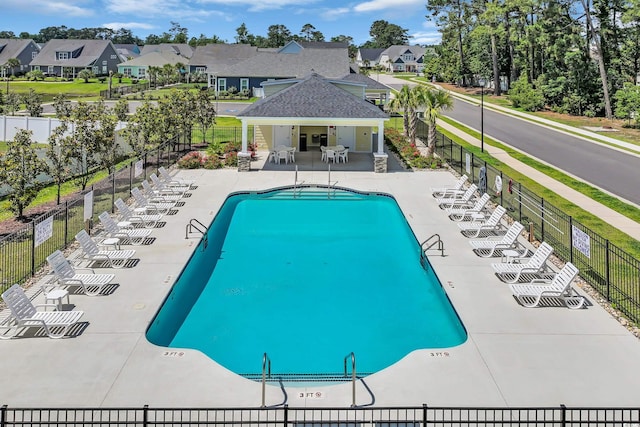 1012 Mary Read Dr, North Myrtle Beach, SC 29582 - community pool featuring a patio area and a residential view