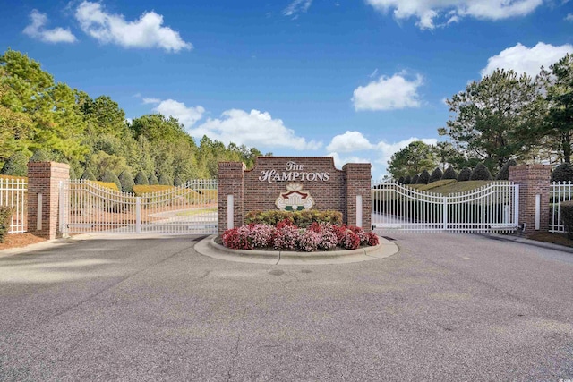 8715 Baton Rouge Ave NW, Calabash, NC 28467 - community sign featuring a gate