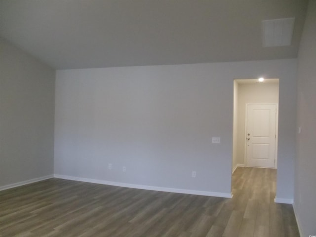 8715 Baton Rouge Ave NW, Calabash, NC 28467 - unfurnished room featuring dark wood-style flooring and baseboards
