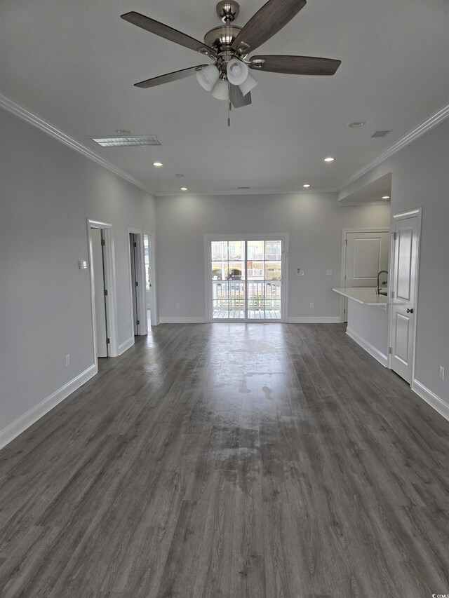 4823 Riverside Dr, North Myrtle Beach, SC 29582 - unfurnished living room featuring ornamental molding, ceiling fan, dark wood finished floors, recessed lighting, and baseboards