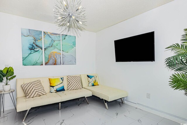 5905 S Kings Hwy Unit 344B, Myrtle Beach, SC 29575 - sitting room featuring a chandelier, marble finish flooring, a textured ceiling, and baseboards