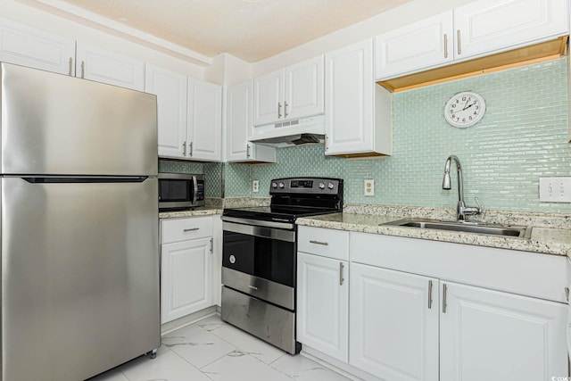 5905 S Kings Hwy Unit 344B, Myrtle Beach, SC 29575 - kitchen featuring stainless steel appliances, under cabinet range hood, a sink, light marble finish flooring, and white cabinets