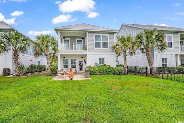 104 Splendor Cir, Murrells Inlet, SC 29576 - back of property with a balcony, a patio area, and metal roof