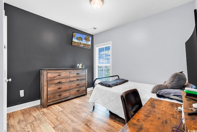 104 Splendor Cir, Murrells Inlet, SC 29576 - bedroom with light wood-style flooring and baseboards