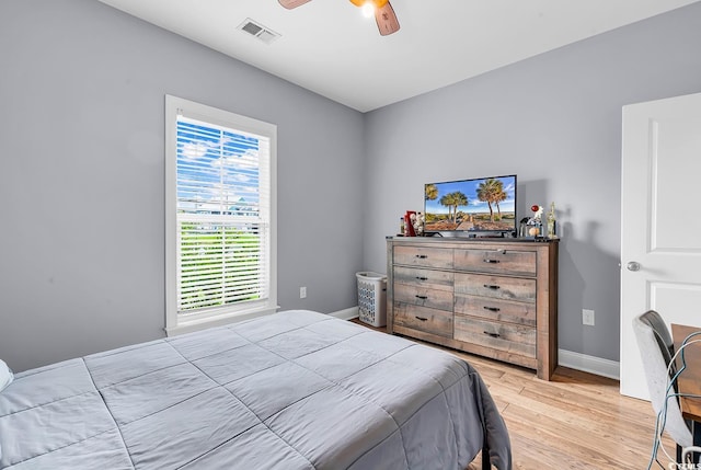 104 Splendor Cir, Murrells Inlet, SC 29576 - bedroom with light wood-type flooring, baseboards, and ceiling fan